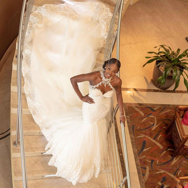 2021 Luxury New Arabic Aso Ebi Mermaid Wedding Dresses Halter Illusion Lace Appliques Crystal Beaded Long Chapel Train Formal Bridal Gowns
