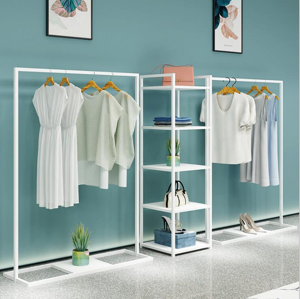 Simple clothing store display rack floor type men's shop shelf women's cloth hanging clothes racks white against the wall