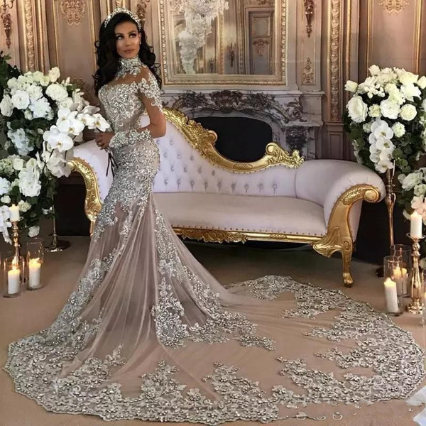 Dubai Arabic Luxury Sparkly 2019 Wedding Dresses Sexy Beaded Lace Applique High Neck Illusion Long Sleeves Mermaid Chapel Bridal Gown